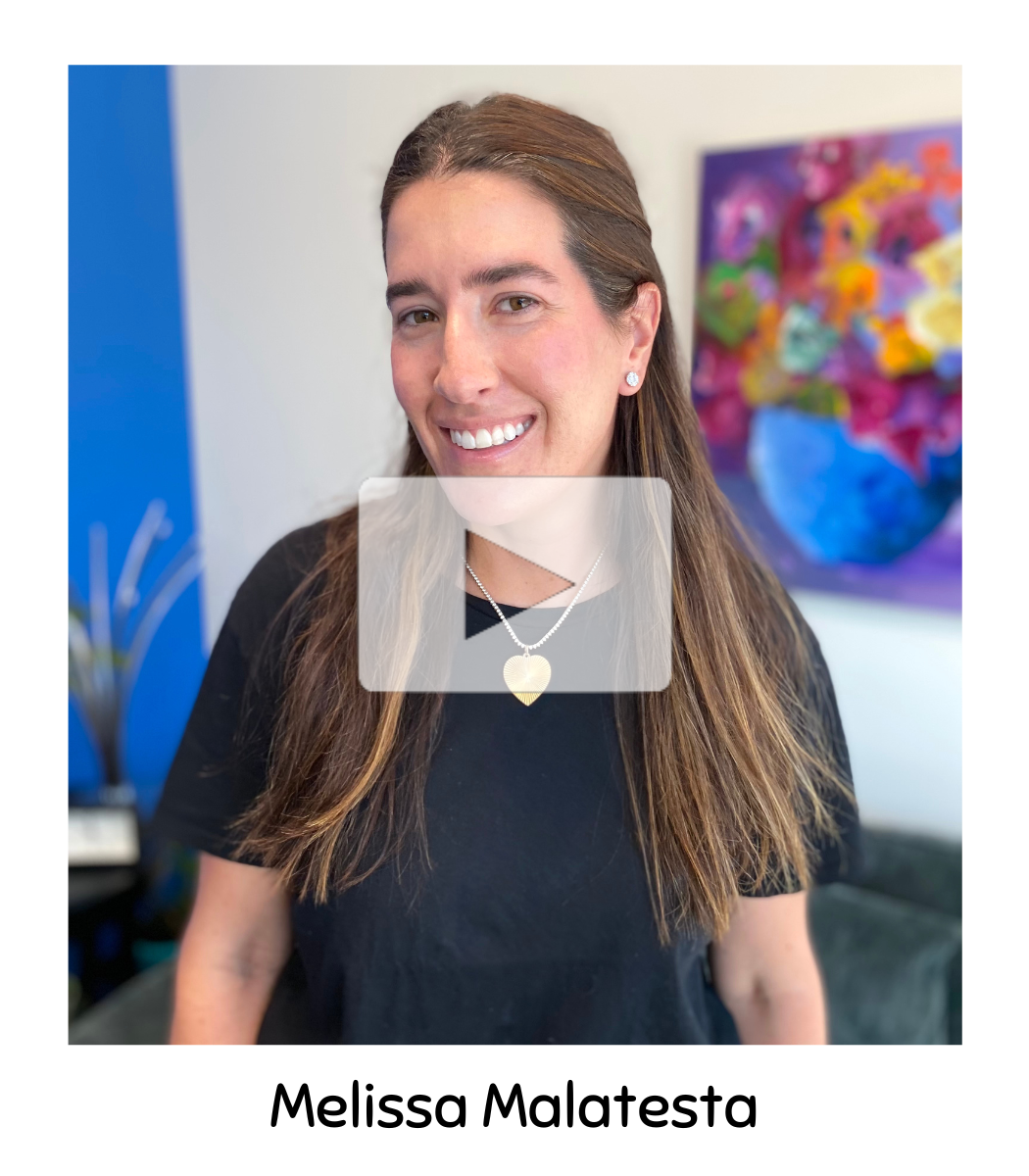 Melissa Malatesta smiles warmly at the camera.